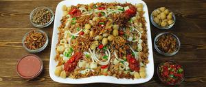 Koshary ist eine Mischung aus Reis, Linsen, Kichererbsen und Nudeln.