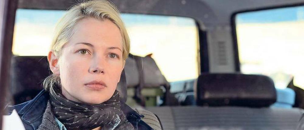 Willenstark. Gina (Michelle Williams) möchte ein Haus in der Wildnis bauen. 