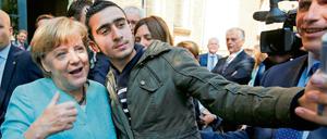 Ein Foto, ein Verhängnis: Der Syrer Anas Modamani beim Selfie mit der Kanzlerin. 