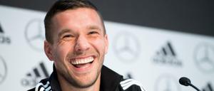 Gelöst: Lukas Podolski bei der Pressekonferenz vor seinem Abschiedsspiel.