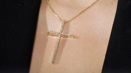 Streit ums Kreuz. Das Berliner Neutralitätsgesetz untersagt das Tragen religiöser Symbole.