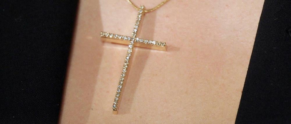 Streit ums Kreuz. Das Berliner Neutralitätsgesetz untersagt das Tragen religiöser Symbole.
