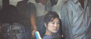 Eine Frau im Bus. Das Bild stammt aus dem Buch „North Korea – The Power of Dreams“ der Fotografin Xiomara Bender.