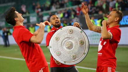 Die Besten im Lande. Lewandowski, Arturo Vidal and Rafinha feiern den Titel.