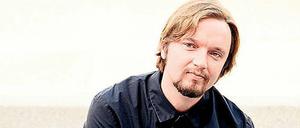 Der lettische Dirigent Ainars Rubikis.