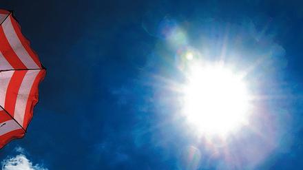 Zeit für den Sonnenschirm. Weniger Arbeitstage im Jahr heißt weniger Tage Urlaub.