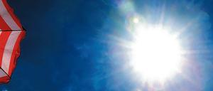 Zeit für den Sonnenschirm. Weniger Arbeitstage im Jahr heißt weniger Tage Urlaub.