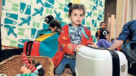 Koffer packen. In der neuen Mitmachausstellung lernen Kinder spielerisch fremde Kulturen kennen.