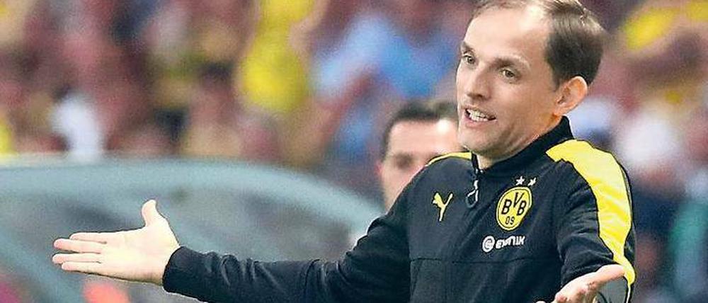 Keine leeren Hände mehr. Thomas Tuchel kann gegenüber der Klubführung von Borussia Dortmund nun auch seinen ersten Titel vorweisen.