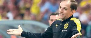 Keine leeren Hände mehr. Thomas Tuchel kann gegenüber der Klubführung von Borussia Dortmund nun auch seinen ersten Titel vorweisen.