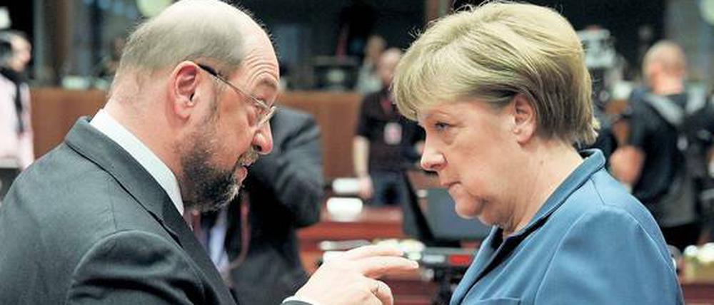 SPD-Herausforderer Martin Schulz und Kanzlerin Angela Merkel treffen sich am 3. September im Fernsehstudio.