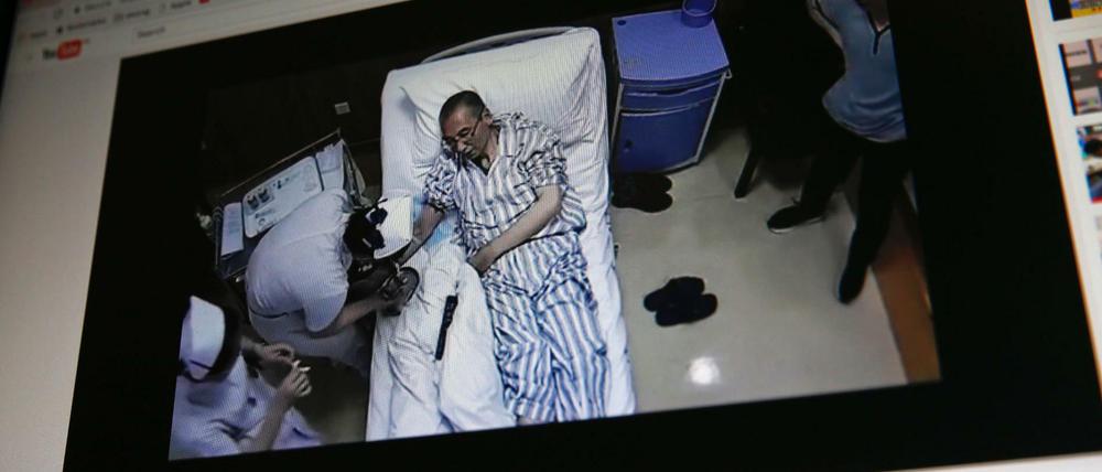 Das Foto von einem Video auf einem Monitor - mit unklarer Quelle - zeigt Liu Xiaobo.