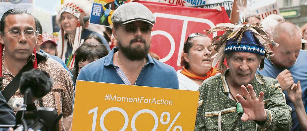 Der Schauspieler Leonardo Di Caprio (mitte) war im September 2014 mitten drin - im Marsch für Klimaschutz in New York.