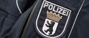 Wappen der Berliner Polizei. Die will in Zukunft besser bezahlt werden.