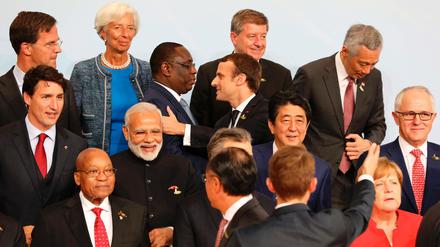 Schwierige politische Gemengelage - doch am Ende soll es beim G20-Gipfel Einigkeit und eine Abschlusserklärung geben. 