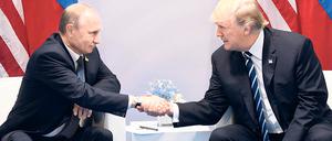 Schwänzten gemeinsam die Klimagespräche bei G 20: Wladimir Putin und Donald Trump.