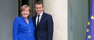 Angela Merkel und Emmanuel Macron am Donnerstag in Paris.