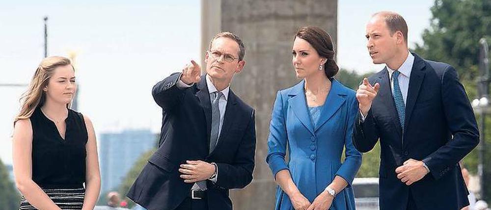 Rampenlicht. Müller und seine Tochter begleiten die Royals durchs Brandenburger Tor.