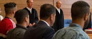 Die drei Männer organisierten eine Überfahrt, bei der mindestens 13 Menschen starben.