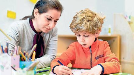 Spielend integriert. Dieses Kind aus einer irakischen Flüchtlingsfamilie hat einen Kitaplatz bekommen.