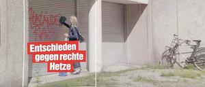 Alles muss weg. Eine Frau wischt im Wahlspot einen Spruch ab.