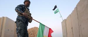 Ein irakischer Soldat in Kirkuk, wo die Regierungstruppen den Gouverneurssitz der Provinz eingenommen haben.