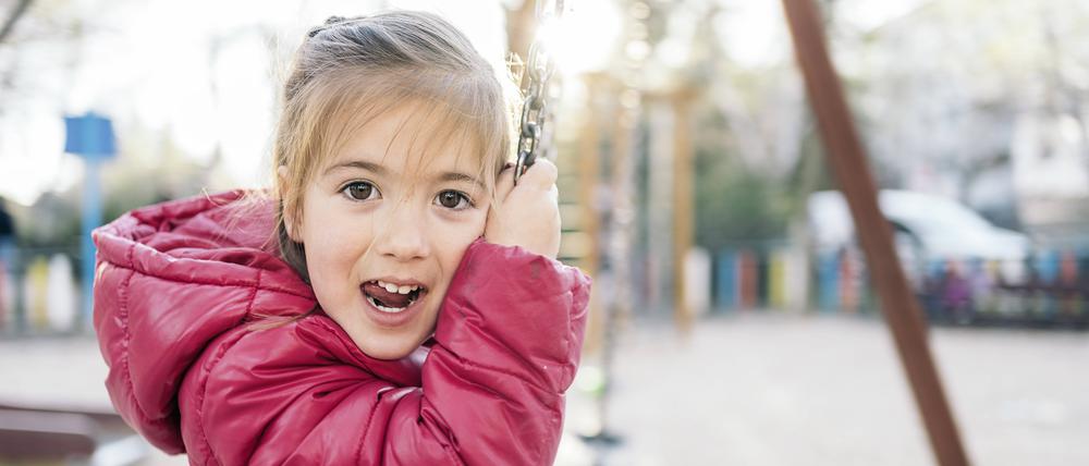 Portrait of a kid in the swing Madrid