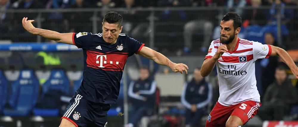 Die Bayern mit Robert Lewandowski (links) hatten Mühe gegen den HSV.