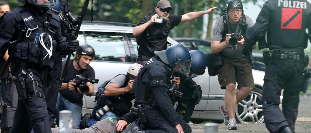 Auf dem G20-Gipfel in Hamburg wurde es oft unübersichtlich. Journalisten wie Martin Kaul (nicht im Bild) berichteten unermüdlich.