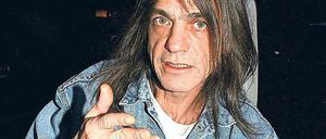 Bevorzugte die Normalo-Uniform. Malcolm Young in Jeans, Jeansjacke, T-Shirt. 