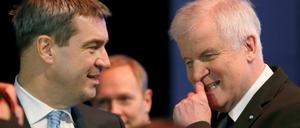 FILE PHOTO: Bavarian Prime Minister and head of the Christian Social Union (CSU) Horst Seehofer listens to Bavarian Finance Minister Markus Soeder (L) during a CSU party congress in Munich, Germany November 20, 2015. REUTERS/Michaela Rehle/File Photo