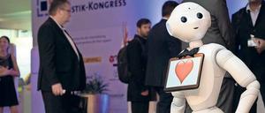 Neue Formen der Arbeit und Produktion. Auf die Unternehmen in Deutschland wie auf ihre Mitarbeiter kommen mit der Digitalisierung große Herausforderungen zu. 