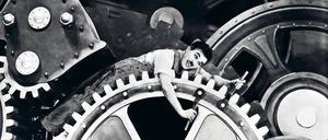 Charlie Chaplin in seinem Film „Moderne Zeiten“ von 1936.