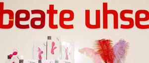 A picture taken on July 23, 2013 in Flensburg shows sex toys displayed on shelves at a shop of the pioneering German sex shop chain Beate Uhse. The pioneering Germ