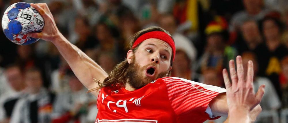 Dänischer Rockstar. Mikkel Hansen und Dänemark schlagen Deutschland knapp.