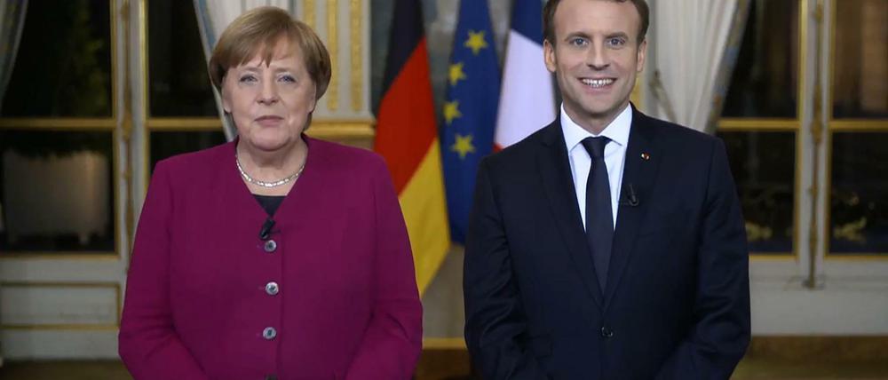 Kanzlerin Merkel und Frankreichs Staatschef Macron veröffentlichten am Sonntag eine gemeinsame Videobotschaft.