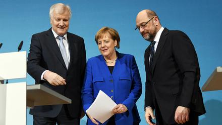 Optimisten unter sich: Seehofer, Merkel und Schulz wollen eine neue Groko.