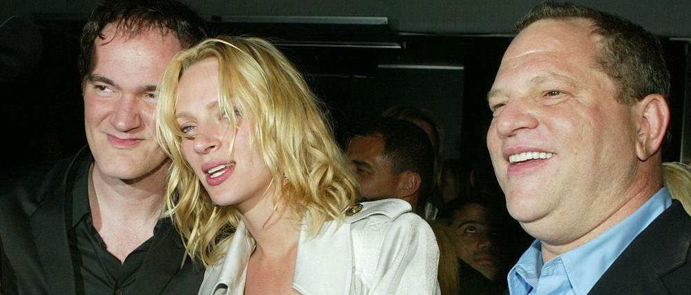 Dieses Bild von 2004 zeigt Uma Thurman mit Harvey Weinstein (r.) und Quentin Tarantino (l.).