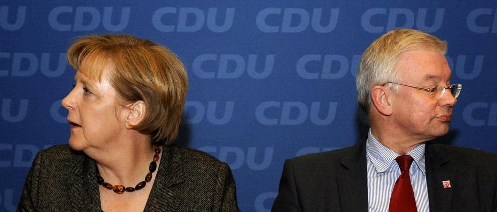 Angela Merkel und Hessens Ex-Ministerpräsident Roland Koch 2010.