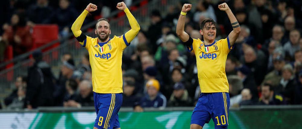 Kaum zu glauben. Gonzalo Higuain (l.) und Paulo Dybala stehen mit Juventus im Viertelfinale der Champions League.