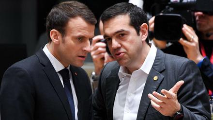 Frankreichs Präsident Emmanuel Macron (links) und der griechische Premier Alexis Tsipras beim EU-Gipfel in Brüssel.