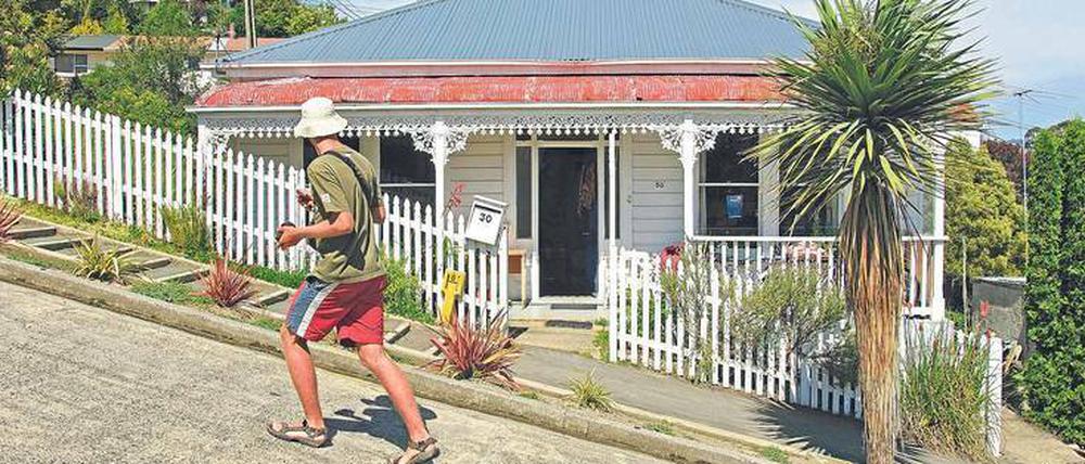 An einen Hang in Dunedin bauten Siedler die steilste Straße der Welt.