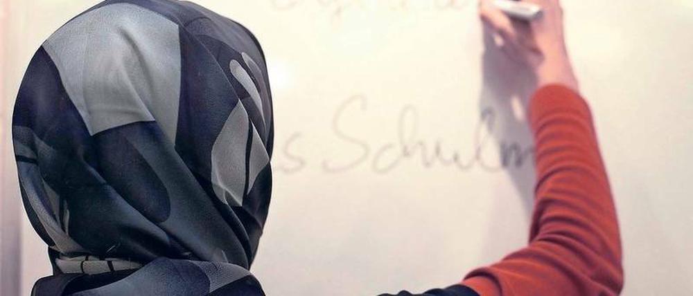 Gefahr für den Schulfrieden? An Berliner Grundschulen ist das Kopftuch verboten.