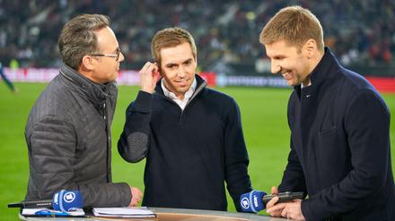 Beim WM-Testspiel Deutschland-Spanien war Weltmeister Philipp Lahm (Mitte) noch bei Moderator Matthias Opdenhövel (links) und ARD-Experte 