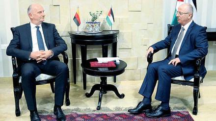 Brandenburgs Ministerpräsident Dietmar Woidke (l.) mit Rami Hamdallah. 