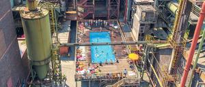 Pool-Party. Früher wurde in der Zeche Zollverein Kohle abgebaut. Heute kann man sich im ehemaligen Werksbad erfrischen.