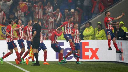 Jubeltraube. Atleticos Spieler feiern ihren dritten Sieg in der Europa League nach 2010 und 2012. 