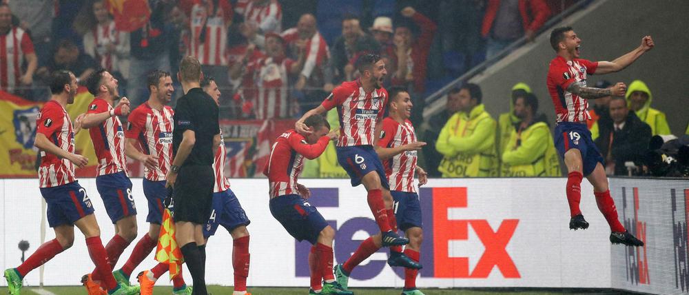 Jubeltraube. Atleticos Spieler feiern ihren dritten Sieg in der Europa League nach 2010 und 2012. 