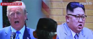 Bisher nur in der Bildmontage, wie hier in einer südkoreanischen Nachrichtensendung, Seite an Seite: Donald Trump und Kim Jong Un.