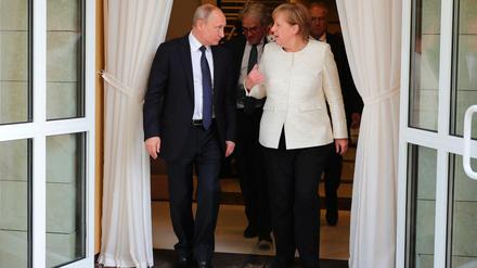 Bundeskanzlerin Angela Merkel (CDU) und Wladimir Putin, Präsident von Russland, nach ihrem Treffen.